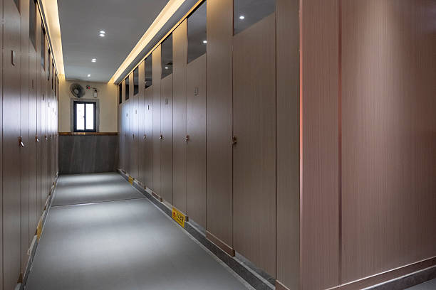 istock Modern Bathroom Interior with Wooden Panels and Recessed Lighting 2230889679