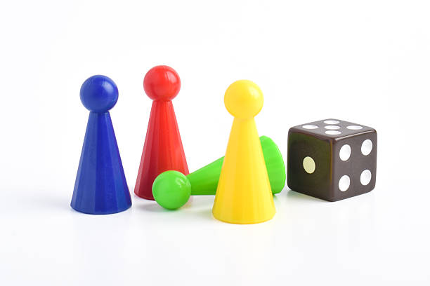 Colorful board game figures and dice
