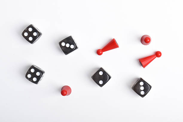 istock Board game figures and dice on white background 2230891970
