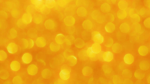 istock Abstract gold yellow bokeh background. 2230893962