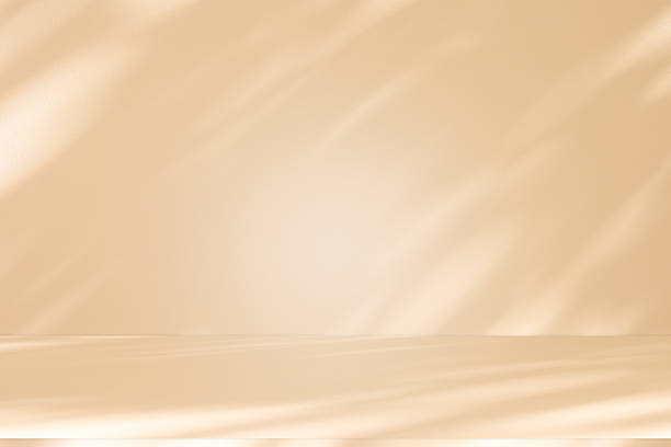 istock Studio style background wall decoration presentation uses white and beige tones. with shadows cast from a nearby window, concept creating a decorative 2230894881