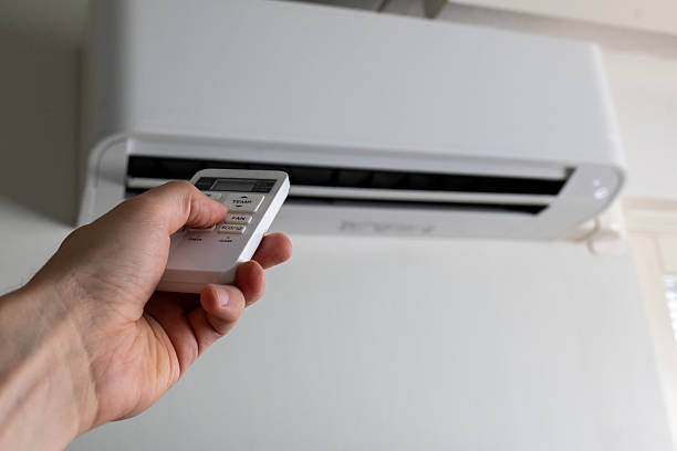 istock Controlling Home Climate With Remote Air Conditioner 2230905575