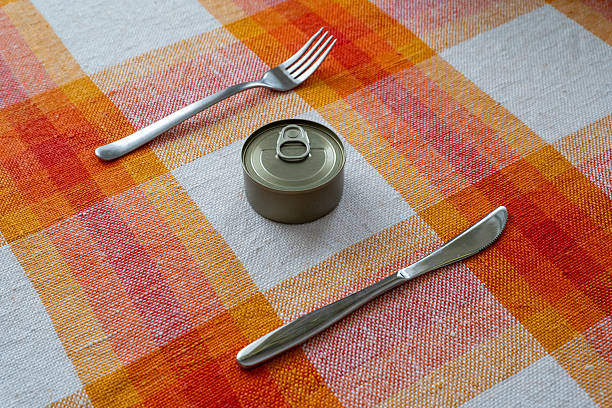 Canned Food Ready For Meal Preparation With Utensils