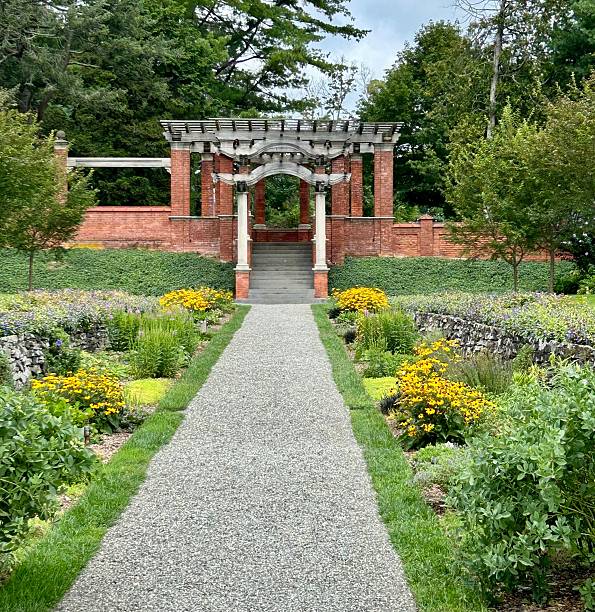 istock Garden Pathway to Brick Pergola 2230907514