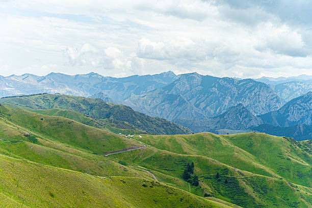 istock Scenery of grasslands and mountains 2230908058