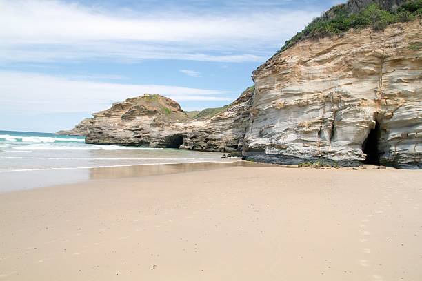 A scenic view of the sandstone caves at Ghosties Beach