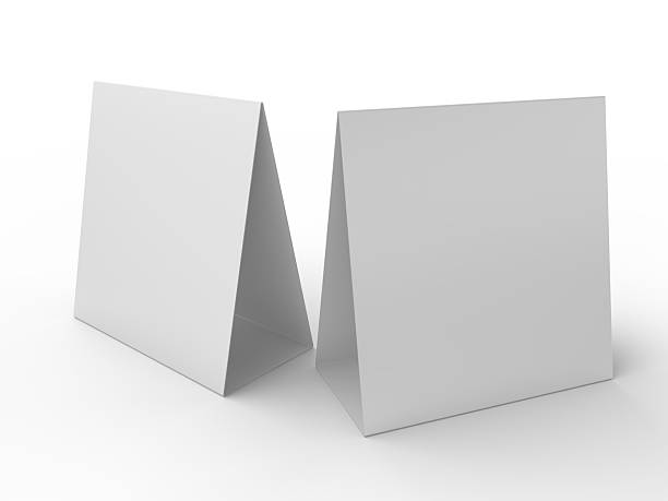 istock 3D realistic mockup of a blank table sign tent card square format, isolated on white. Minimal display Ideal for menu, restaurant, cafe, event, promotion, branding, ads, and marketing design 2230911154