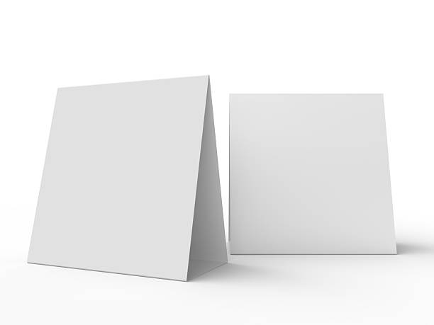 istock 3D realistic mockup of a blank table sign tent card square format, isolated on white. Minimal display Ideal for menu, restaurant, cafe, event, promotion, branding, ads, and marketing design 2230911159