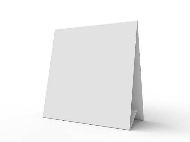 istock 3D realistic mockup of a blank table sign tent card square format, isolated on white. Minimal display Ideal for menu, restaurant, cafe, event, promotion, branding, ads, and marketing design 2230911165