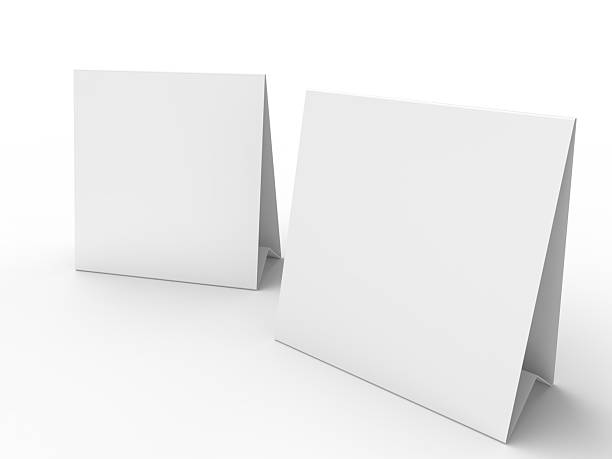 istock 3D realistic mockup of a blank table sign tent card square format, isolated on white. Minimal display Ideal for menu, restaurant, cafe, event, promotion, branding, ads, and marketing design 2230911168