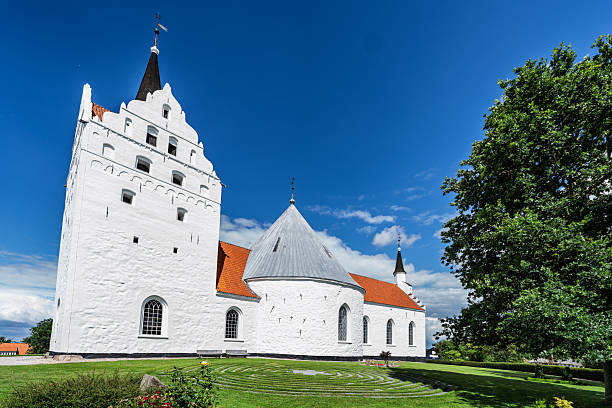 A typical Danish stepped gable on the Church of Our Lady (Vor Frue Kirke) in central Aarhus, a city in Jutland, Denmark. The church and its accompanying buildings date from the middle ages - the 11th century stone crypt of the current church is the only surviving part of the early church.
