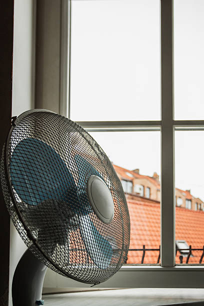 istock Home electric fan for blowing on a hot day 2230917203
