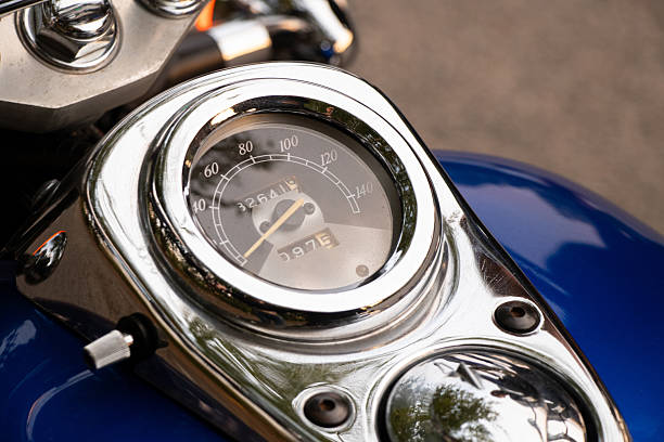 Speedometer of a vintage motorcycle close up in garage