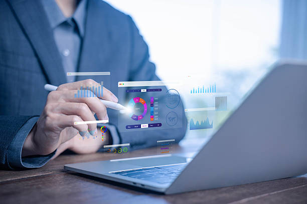 istock Data analytics dashboard concept with businessman using laptop and digital pen, showing charts, graphs, and business intelligence visualization for modern corporate decision making solutions. 2230921258