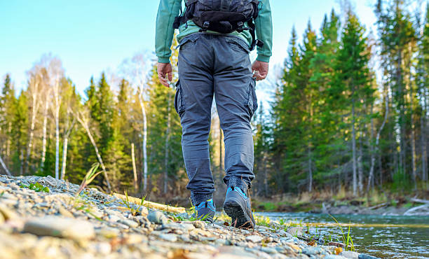 istock one men hiking in the autumn forest 2230924407