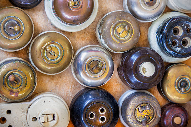 istock Weathered vintage light switches 2230934033