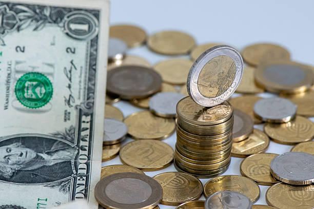 istock Euro Coins and US Dollar for Currency Exchange Concept 2230934355
