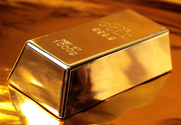 istock Gold bars on a golden background 2230936322