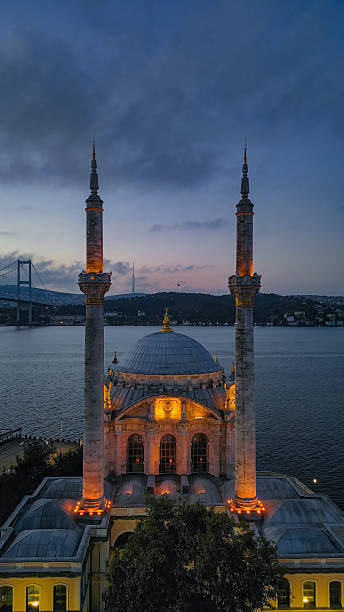 istock Ortakoy Mosque framed between illuminated minarets with Bosphorus Bridge at dusk in Istanbul, Turkiye 2230937283