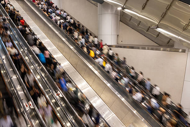 Tokyo, Japan - July 14, 2016: Middle aged business man commutes via Tokyo subway system.