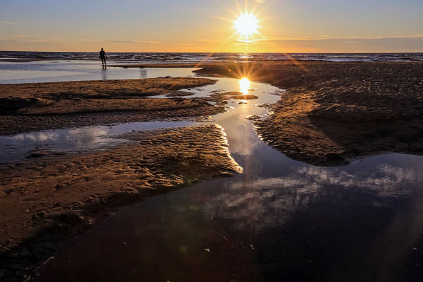 istock Sunset at the beach Saulkrasti, latvia 2230939473