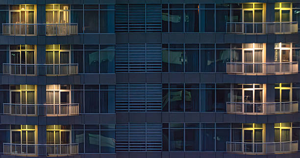 istock Stock Image of Apartment Building Illuminated at Night 2230940767