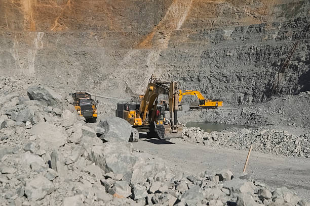 istock Excavator in gold mining quarry, special equipment 2230942957