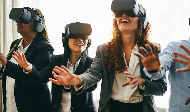 istock Business people wearing vr goggles inside office - New technology and ai concept - Main focus on left asian girl face 2230944587