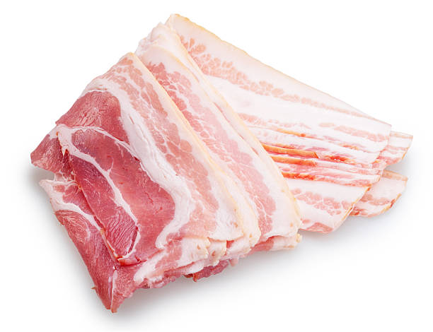 istock Slices of salted and cured uncooked bacon on white background. Clipping path. 2230945996