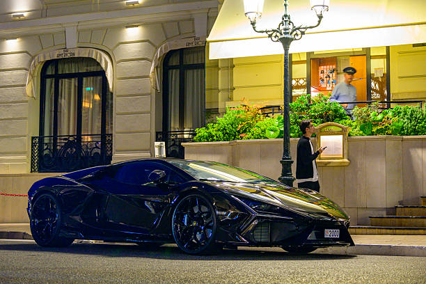 Lamborghini Revuelto high-performance supercar parked on the street in Monaco. The Revuelto is Lamborghini's first plug-in hybrid HPEV (High Performance Electrified Vehicle), is fitted with a 6.5-liter V12 engine and three electric motors producing a combined output of 1,015bhp.