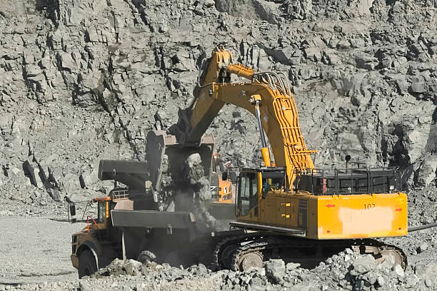 istock Excavator in gold mining quarry, special equipment 2230947559