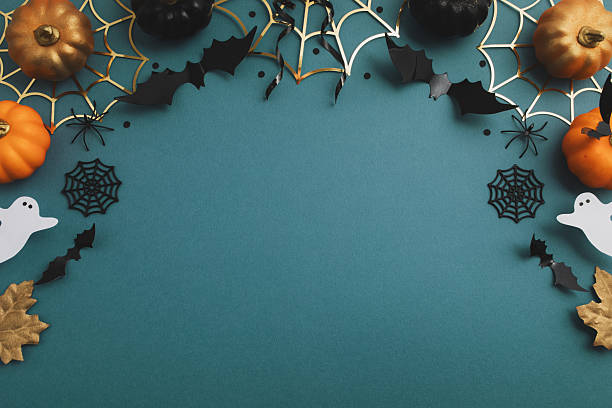 istock Happy Halloween party decorations on dark blue background top view. Halloween border template flat lay. 2230951055