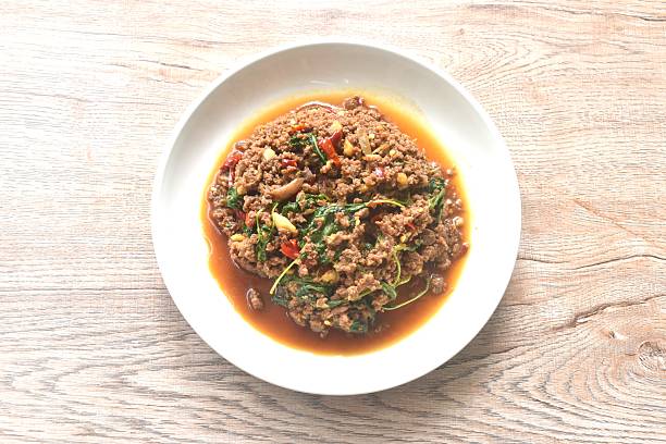 istock spicy stir fried chop beef meat with chili and basil 2230951381