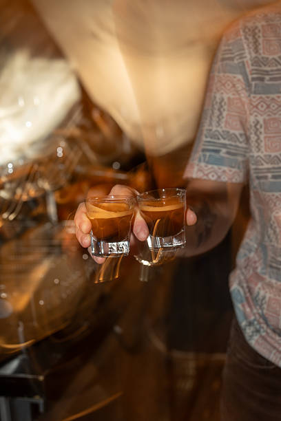 istock Barista Holding Two Fresh Espresso Shots 2230952063