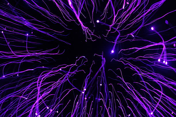 istock Abstract Purple Light Trails on Black Background 2230952267