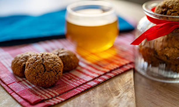 Cup of tea with oatmeal raisin cookies.