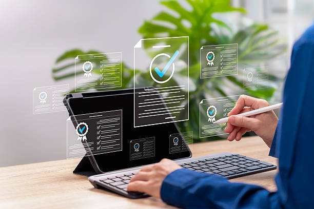 istock Quality Certificate Online Document Concept, Businesswoman Using Tablet for Digital Verification, Reviewing Industrial Standard Compliance, Corporate Certification Audit and Approval Process 2230958002