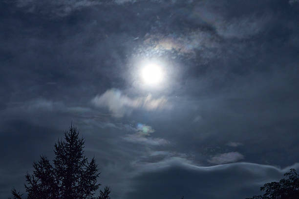 istock A gap in the clouds, a divine light piercing the darkness. 2230958369
