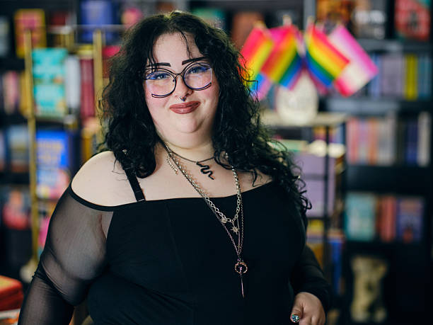 The owner standing in her independent bookstore.