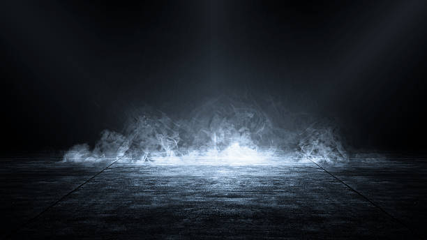 istock Interior view of a dramatic dark room with smoke and a light ray for the stage background. Mockup, copy space, and template 2230960010