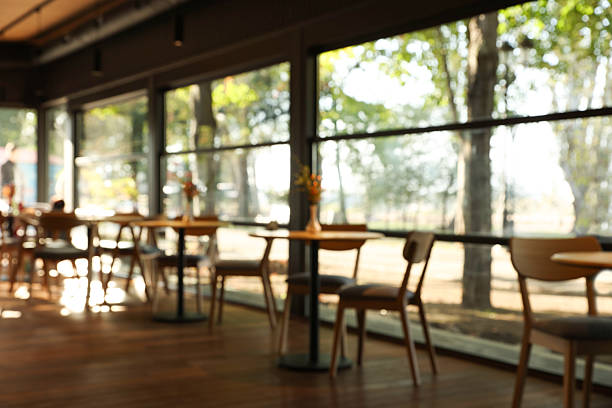 istock Blurred view of stylish cafe with large windows 2230961309