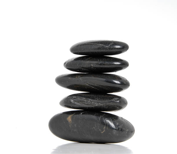 istock Balanced black stones: symbol of tranquility and peace 2230961510