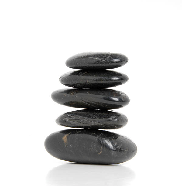 istock Balanced black stones: symbol of tranquility and peace 2230961545