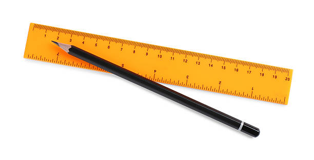 istock Ruler and pencil isolated on white, top view 2230961693