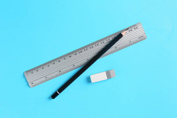 istock Ruler, pencil and eraser on light blue background, flat lay 2230961815