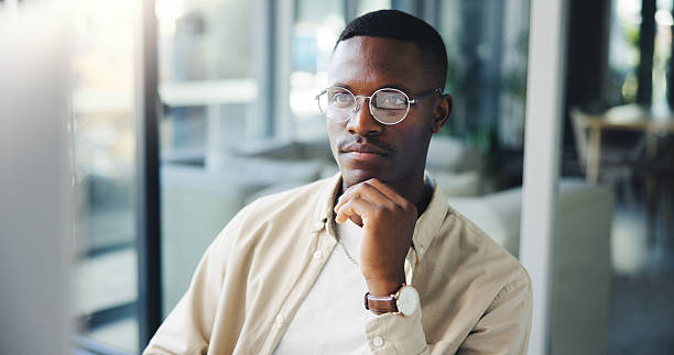 istock Thinking, reading and black man on computer for business decision, insight or journalist planning. Worker, idea and creative brainstorming, problem solving or inspiration for news story in office 2230962362