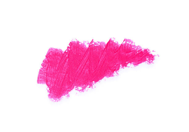Stroke of beautiful lipstick isolated on white, top view