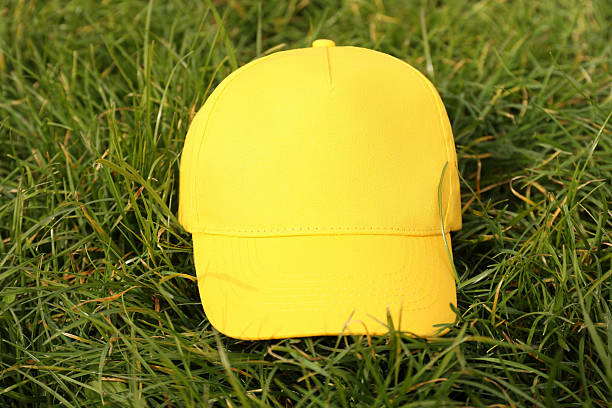 Isolated white baseball cap on a white background.