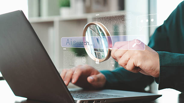 istock Businessman typing on laptop with futuristic AI search bar, big data, and digital interface, representing artificial intelligence, SEO, online research, and modern technology. 2230963013