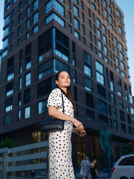 istock Confident Woman with Bag in City 2230966714